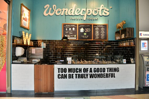 Wonderpots Frozen Yogurt im ALEXA in Berlin - Logo