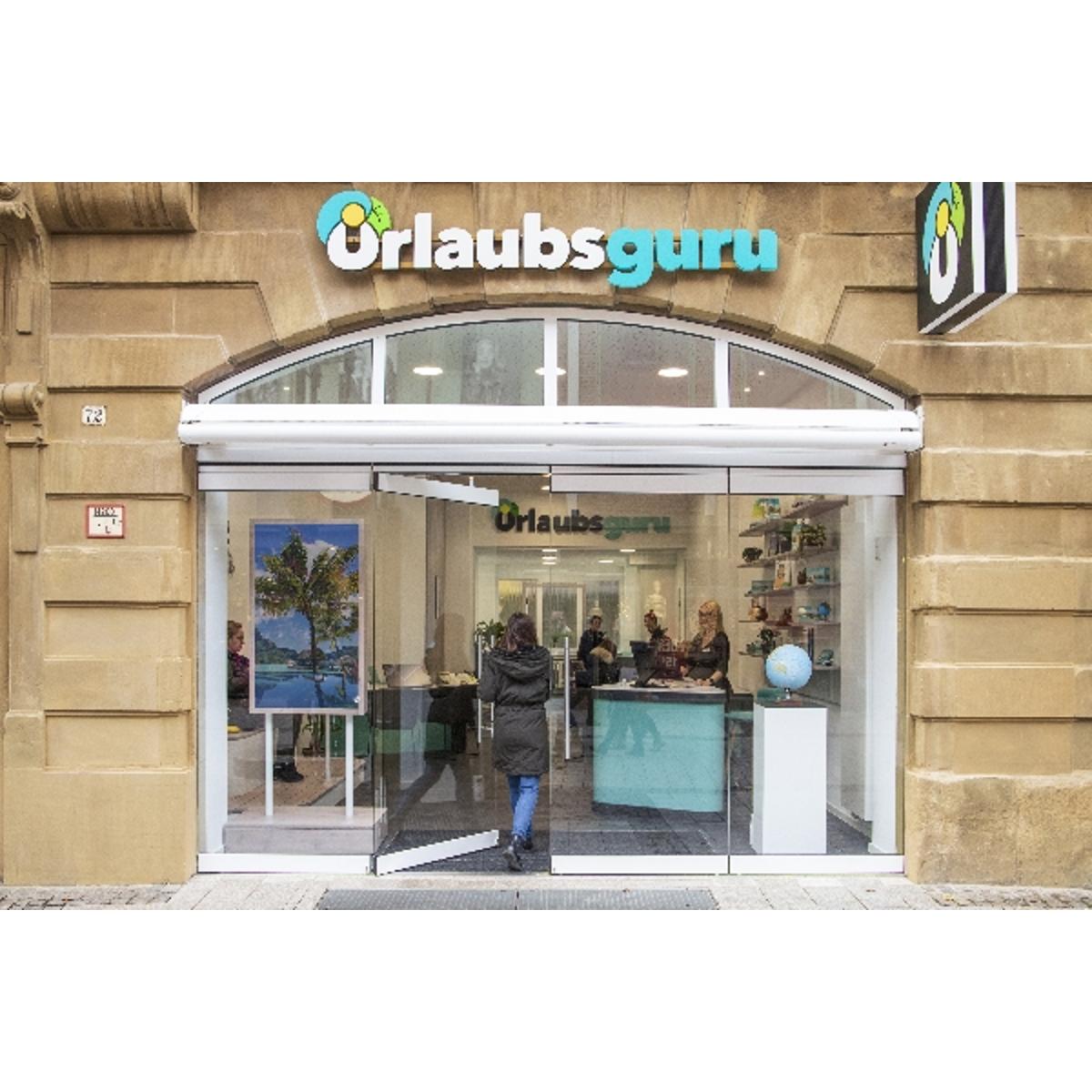 Urlaubsguru Store Münster in Münster - Logo