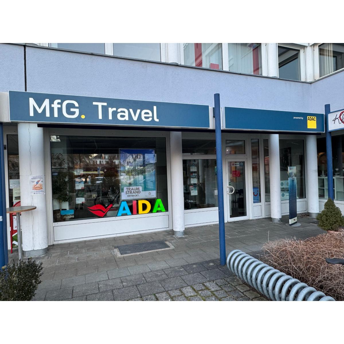 MfG.Travel Reisebüro powered by ADAC in Unterhaching - Logo